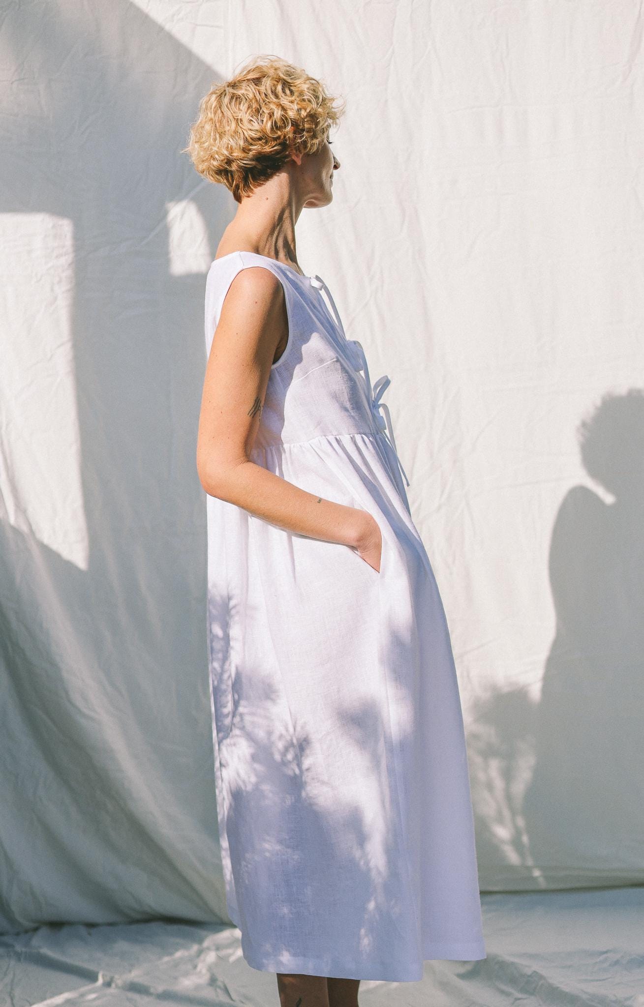 Sleeveless linen dress with ties and ruffled skirt GEMMA • OFFON CLOTHING