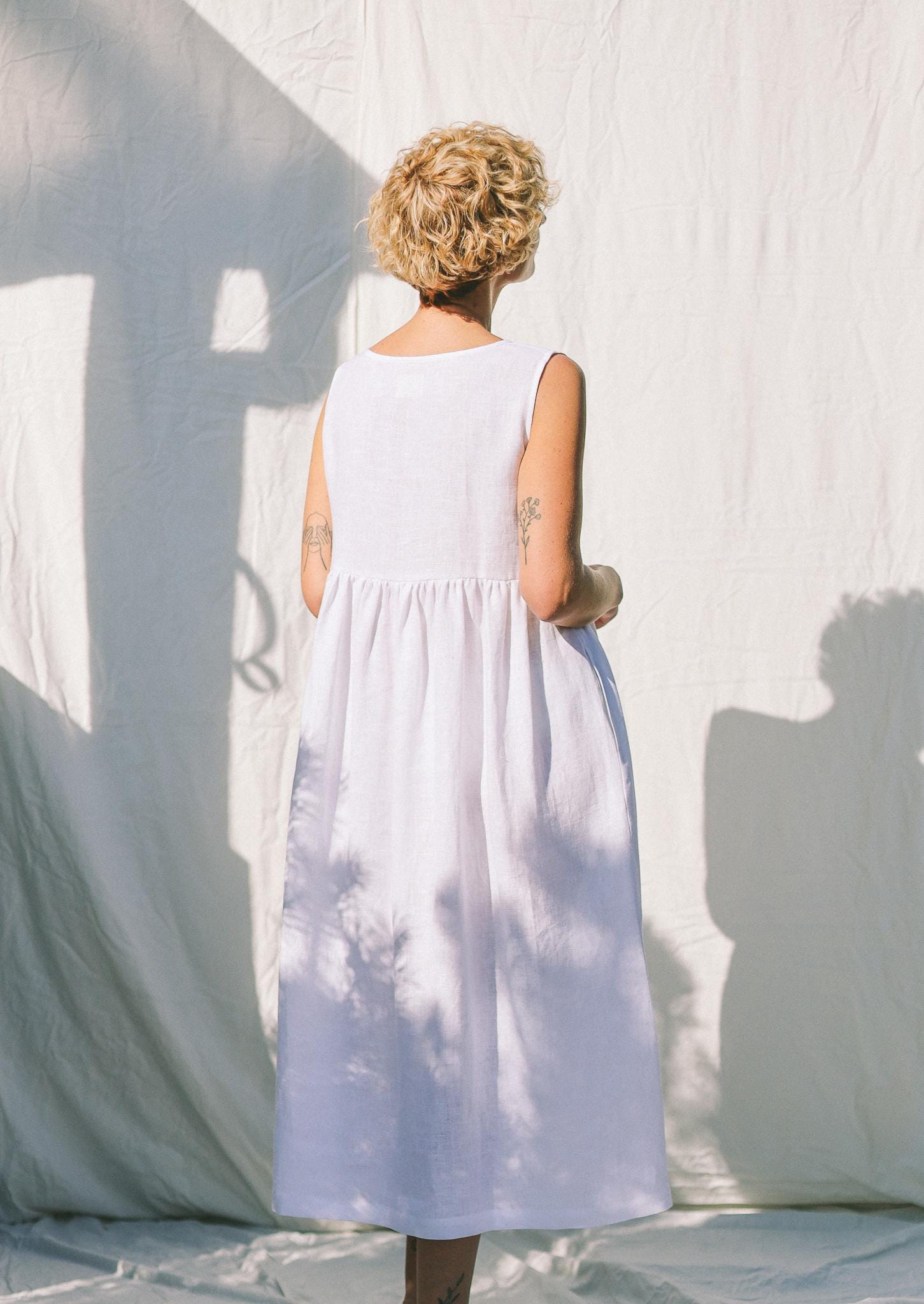 Sleeveless linen dress with ties and ruffled skirt GEMMA • OFFON CLOTHING