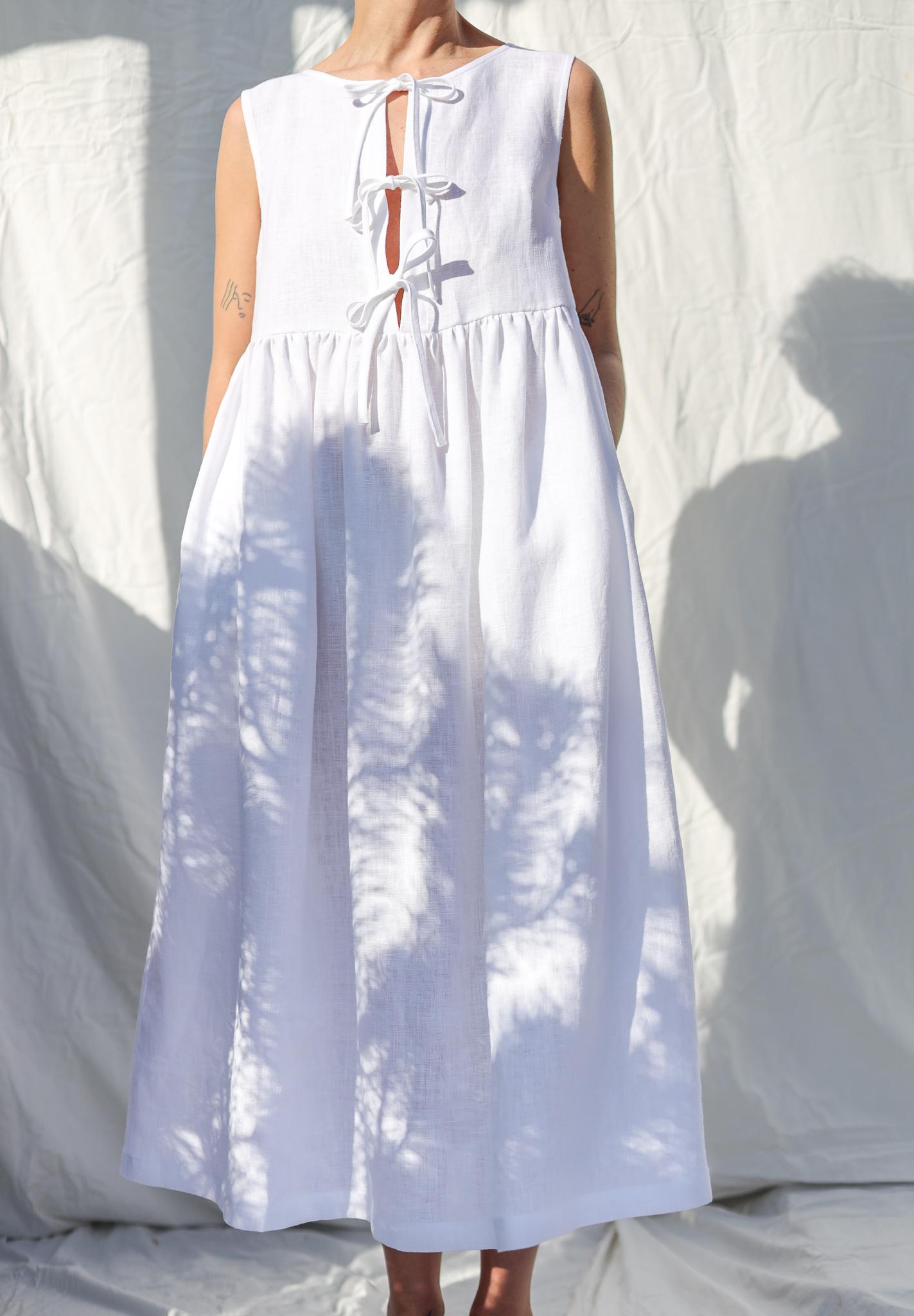 Sleeveless linen dress with ties and ruffled skirt GEMMA • OFFON CLOTHING
