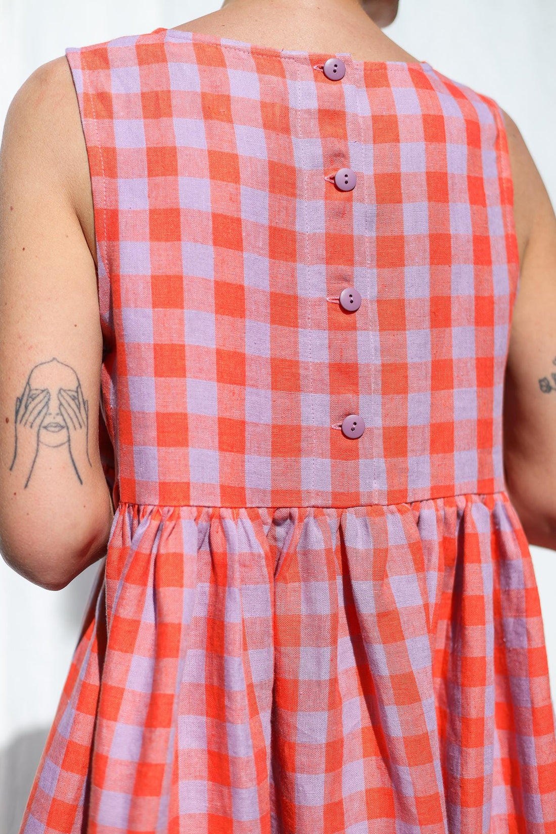 Sleeveless linen smock dress in pink checks • OFFON CLOTHING
