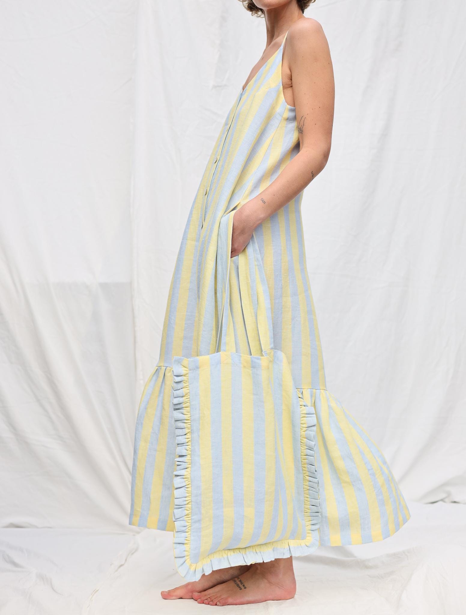 Sleeveless Striped Linen Dress with Ruffled Hem by OFFON Clothing