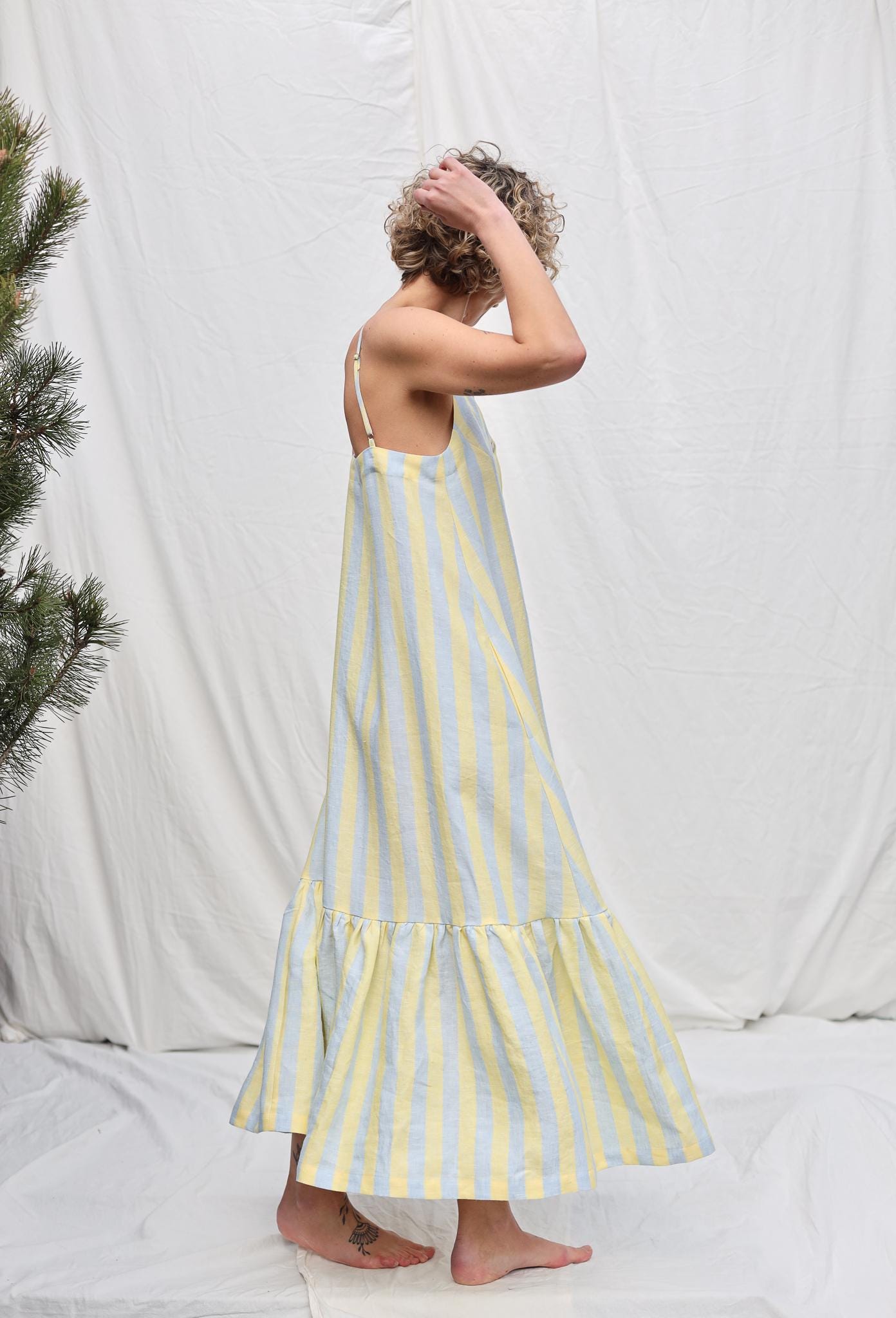 Sleeveless Striped Linen Dress with Ruffled Hem by OFFON Clothing