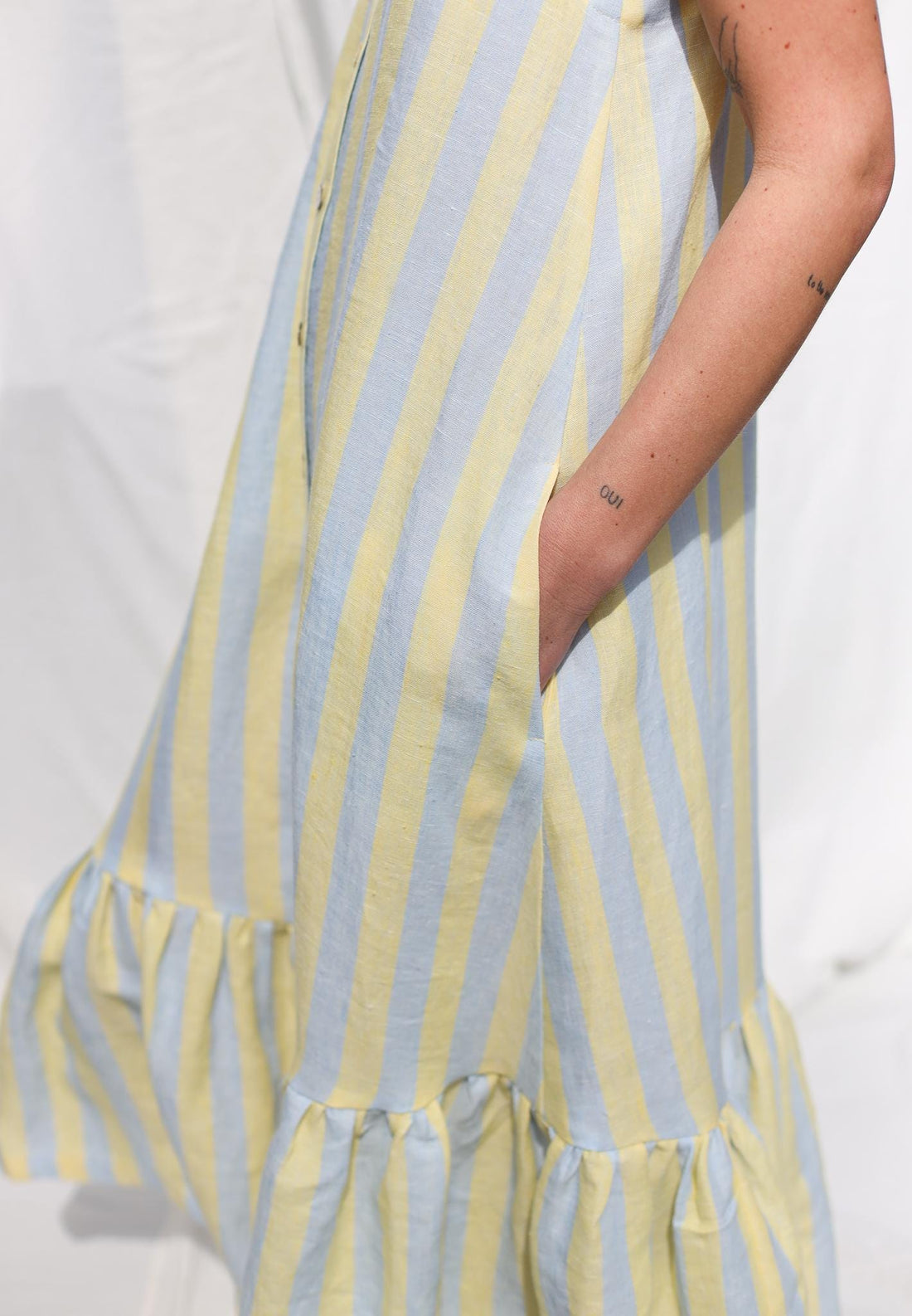 Sleeveless Striped Linen Dress with Ruffled Hem by OFFON Clothing