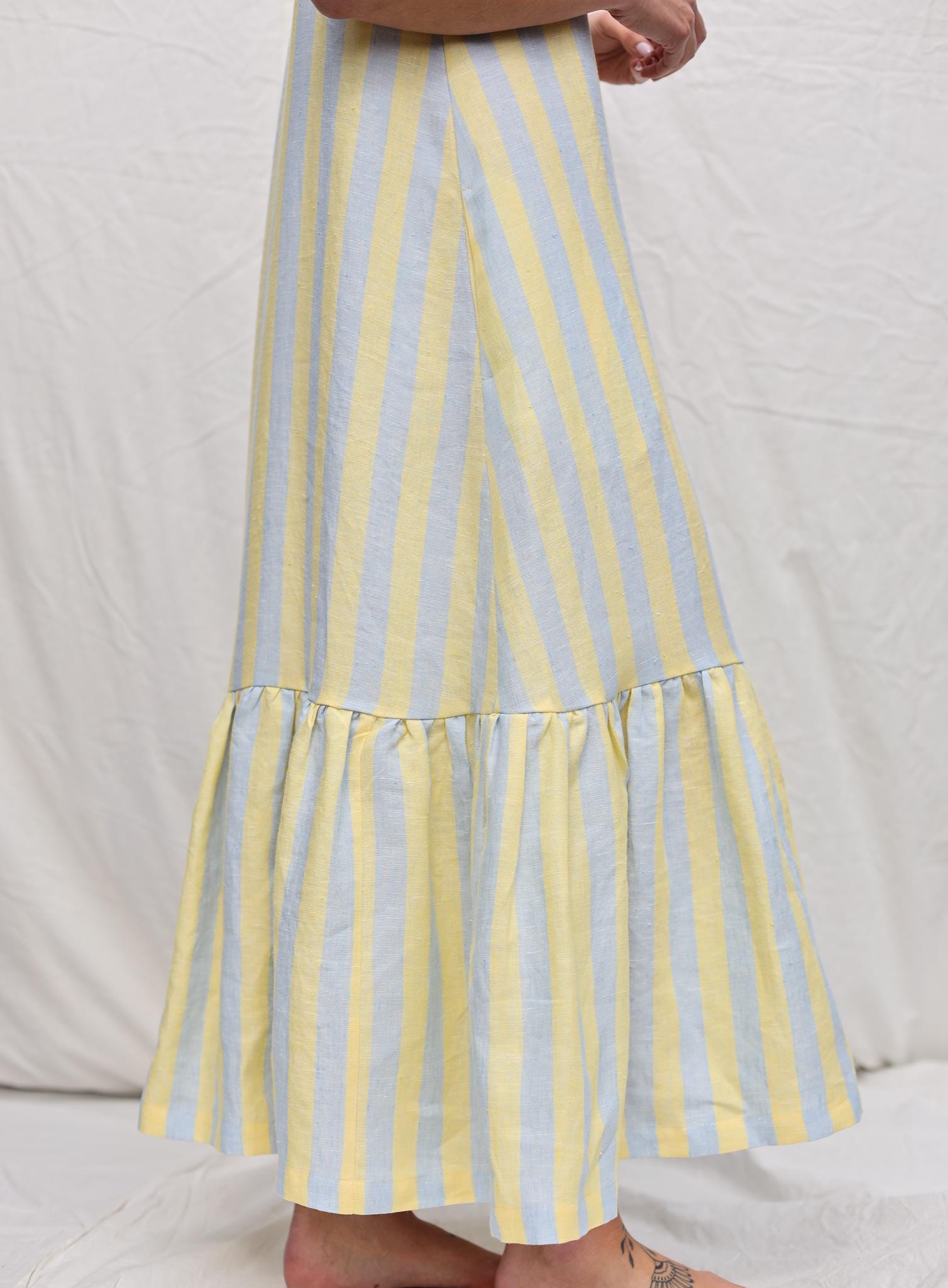 Sleeveless Striped Linen Dress with Ruffled Hem by OFFON Clothing