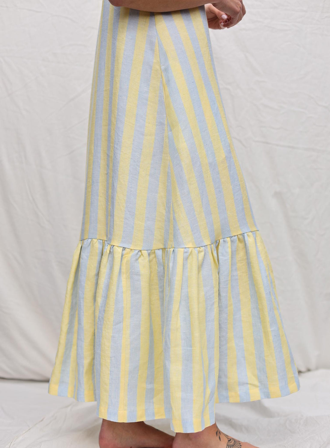 Sleeveless Striped Linen Dress with Ruffled Hem by OFFON Clothing