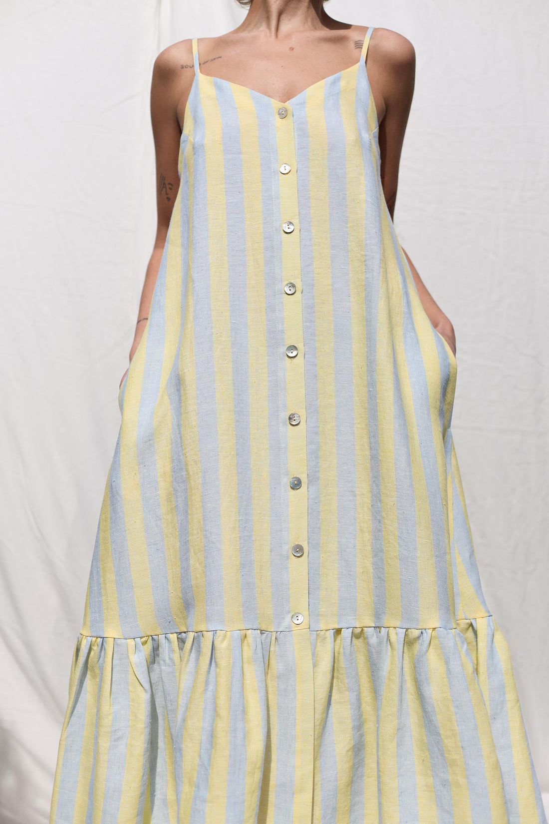 Sleeveless Striped Linen Dress with Ruffled Hem by OFFON Clothing