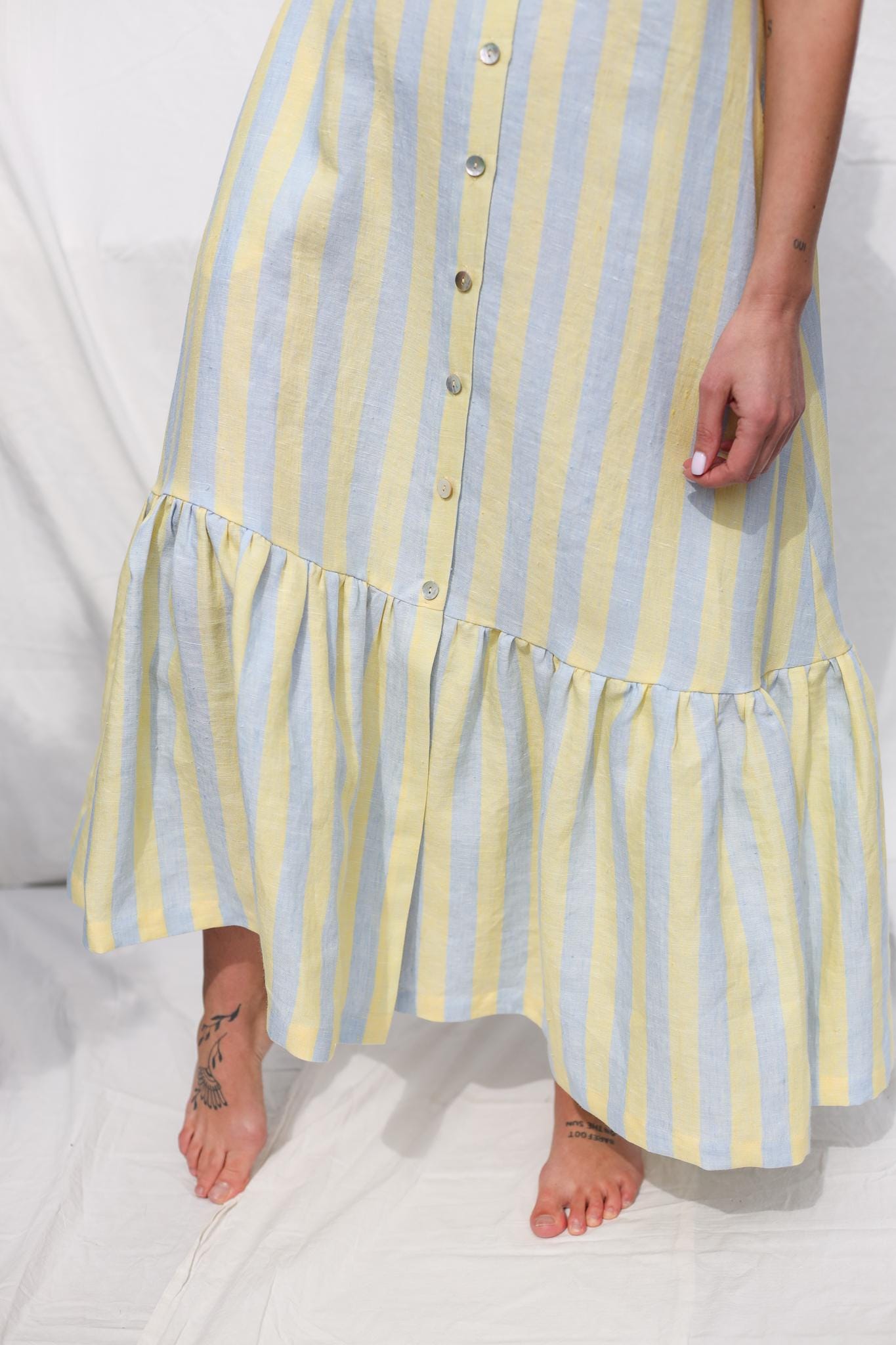 Sleeveless Striped Linen Dress with Ruffled Hem by OFFON Clothing