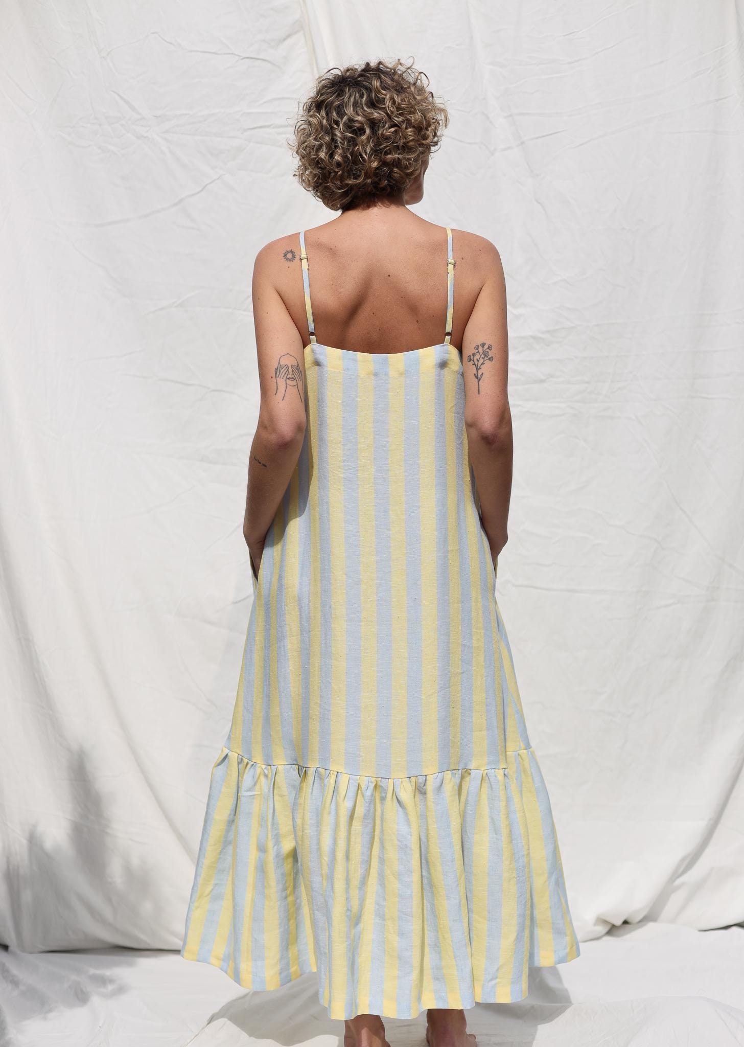 Sleeveless Striped Linen Dress with Ruffled Hem by OFFON Clothing