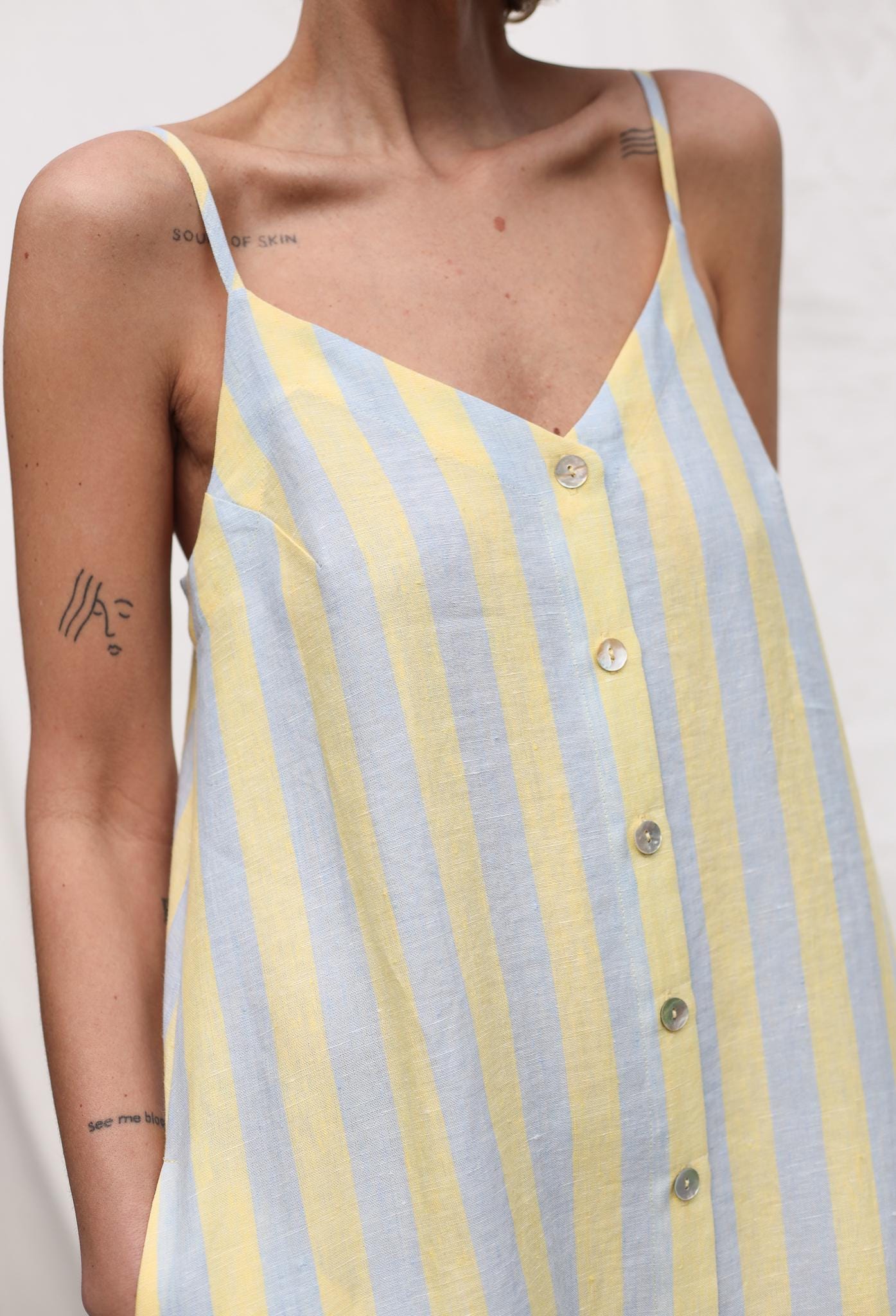 Sleeveless Striped Linen Dress with Ruffled Hem by OFFON Clothing