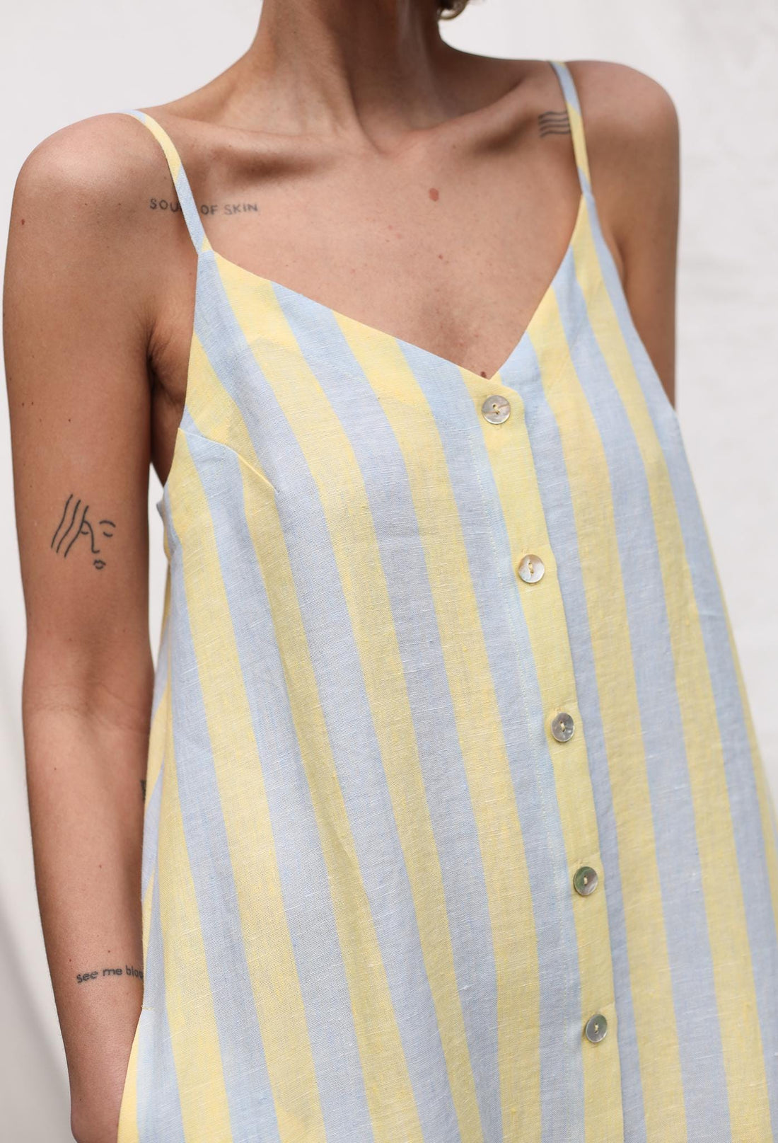 Sleeveless Striped Linen Dress with Ruffled Hem by OFFON Clothing