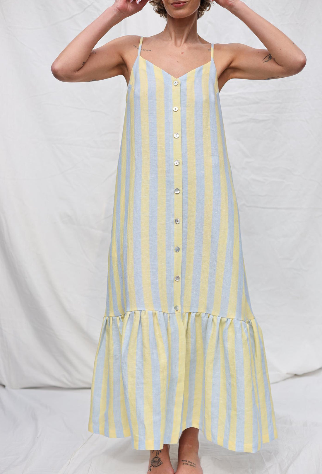 Sleeveless Striped Linen Dress with Ruffled Hem by OFFON Clothing