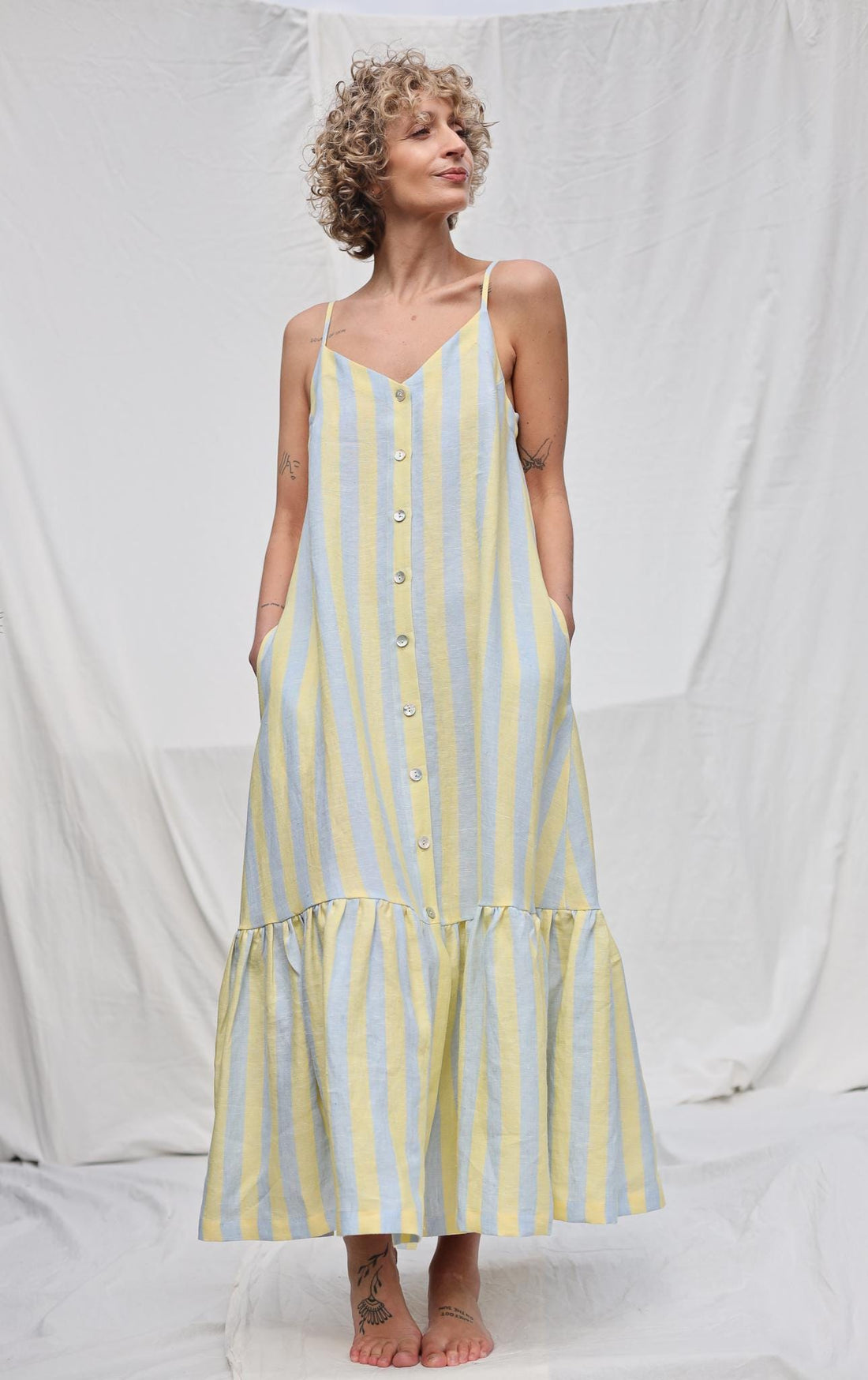 Sleeveless Striped Linen Dress with Ruffled Hem by OFFON Clothing