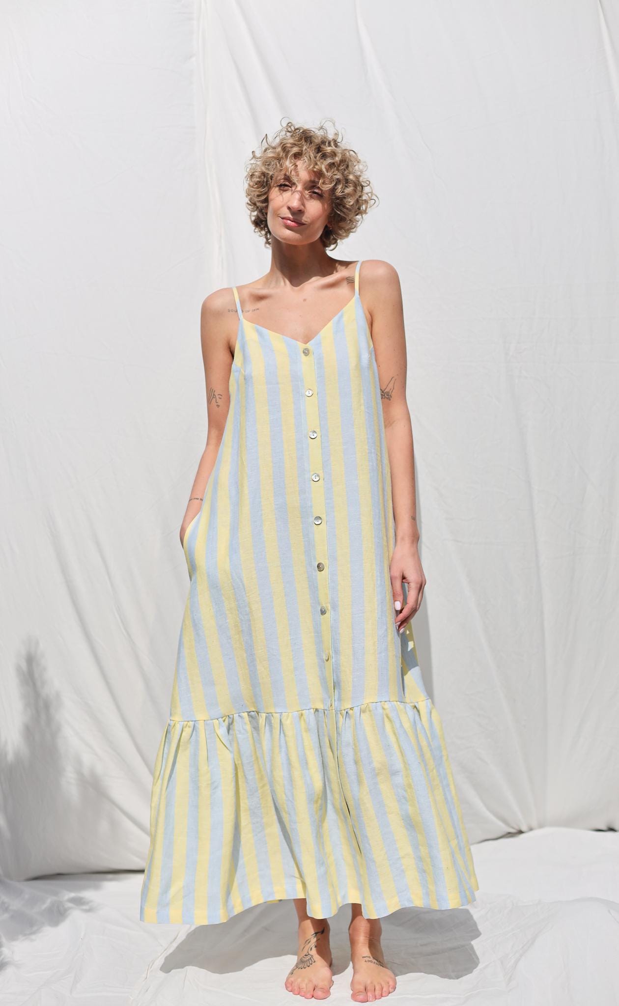 Sleeveless Striped Linen Dress with Ruffled Hem by OFFON Clothing