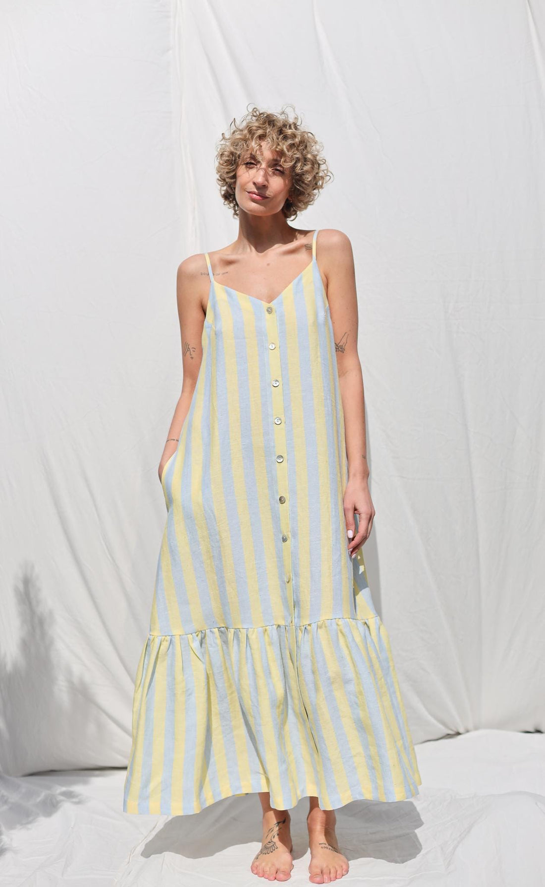 Sleeveless Striped Linen Dress with Ruffled Hem by OFFON Clothing